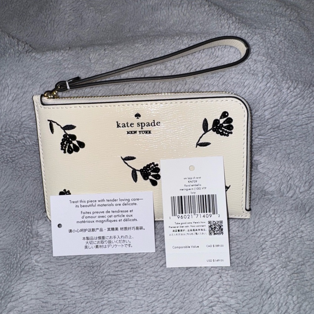 Kate Spade Ivory Wristlet with Black Floral Pattern - Picture 4 of 4